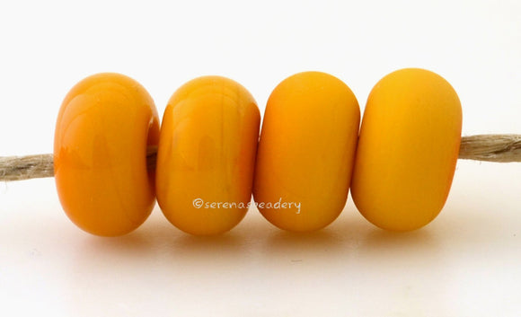 Monarch Color Notes: An opaque yellow orange. Available shapes and sizes:Round Bead Shapes: Available to order 8 to 15 mm with hole sizes ranging from 1.5 to 5 mm. See drop down menu for the exact options. Shown here in 8, 9 and 10 mm with both a 2.5 mm and 1.5 mm hole. 4 and 5 mm holes will fit European Charm style jewelry.Also available in a wavy disk or bead cap:. Pressed bead shapes:Lentil - 12x13 mm in size with a 1.5mm hole.: Pillow 13 mm square with a 1.5 mm hole.: Tab: Default Title