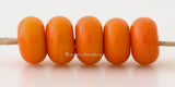 Harvest Color Notes: An opaque earthy orange. Available shapes and sizes:Round Bead Shapes: Available to order 8 to 15 mm with hole sizes ranging from 1.5 to 5 mm. See drop down menu for the exact options. Shown here in 8, 9 and 10 mm with both a 2.5 mm and 1.5 mm hole. 4 and 5 mm holes will fit European Charm style jewelry.Also available in a wavy disk or bead cap:. Pressed bead shapes:Lentil - 12x13 mm in size with a 1.5mm hole.: Pillow 13 mm square with a 1.5 mm hole.: Tab: Default Title