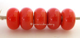 Phoenix Color Notes: An opaque that can be struck to a range of hues from peach to orange coral. Available shapes and sizes:Round Bead Shapes: Available to order 8 to 15 mm with hole sizes ranging from 1.5 to 5 mm. See drop down menu for the exact options. Shown here in 8, 9 and 10 mm with both a 2.5 mm and 1.5 mm hole. 4 and 5 mm holes will fit European Charm style jewelry.Also available in a wavy disk or bead cap:. Pressed bead shapes:Lentil - 12x13 mm in size with a 1.5mm hole.: Pillow 13 mm square with 