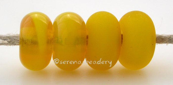Submarine Color Notes: An opaque yellow. Available shapes and sizes:Round Bead Shapes: Available to order 8 to 15 mm with hole sizes ranging from 1.5 to 5 mm. See drop down menu for the exact options. Shown here in 8, 9 and 10 mm with both a 2.5 mm and 1.5 mm hole. 4 and 5 mm holes will fit European Charm style jewelry.Also available in a wavy disk or bead cap:. Pressed bead shapes:Lentil - 12x13 mm in size with a 1.5mm hole.: Pillow 13 mm square with a 1.5 mm hole.: Tab: Default Title
