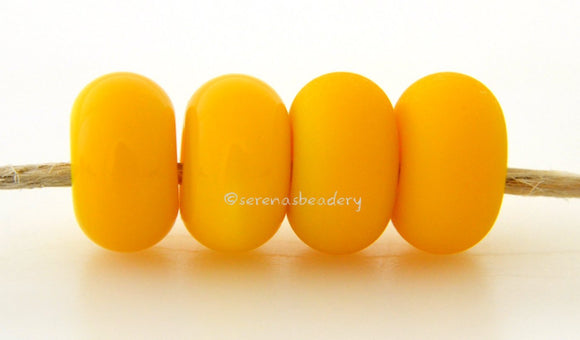 Goldenrod Color Notes: An opaque yellow. Available shapes and sizes: Round Bead Shapes: Available to order 8 to 15 mm with hole sizes ranging from 1.5 to 5 mm. See drop down menu for the exact options. Shown here in 8, 9 and 10 mm with both a 2.5 mm and 1.5 mm hole. 4 and 5 mm holes will fit European Charm style jewelry. Also available in a wavy disk or bead cap: .   Pressed bead shapes: Lentil - 12x13 mm in size with a 1.5mm hole.:   Pillow 13 mm square with a 1.5 mm hole.:   Tab:       Default Title