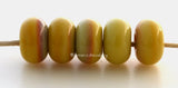 Yellow Brick Road Spacers #1950 5 Yellow Brick Road spacers - 5x10 mm with a 2.5 mm hole, glossy finish. This handmade bead set is ready to ship! Default Title