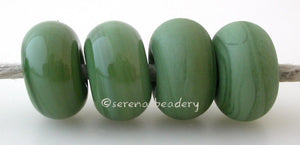 Shrubbery Color Notes: An opaque green. Available shapes and sizes:Round Bead Shapes: Available to order 8 to 15 mm with hole sizes ranging from 1.5 to 5 mm. See drop down menu for the exact options. Shown here in 8, 9 and 10 mm with both a 2.5 mm and 1.5 mm hole. 4 and 5 mm holes will fit European Charm style jewelry.Also available in a wavy disk or bead cap:. Pressed bead shapes:Lentil - 12x13 mm in size with a 1.5mm hole.: Pillow 13 mm square with a 1.5 mm hole.: Tab: Default Title