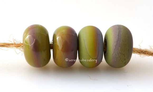 Dragon Color Notes: An opaque green laden with silver. Available shapes and sizes:Round Bead Shapes: Available to order 8 to 15 mm with hole sizes ranging from 1.5 to 5 mm. See drop down menu for the exact options. Shown here in 8, 9 and 10 mm with both a 2.5 mm and 1.5 mm hole. 4 and 5 mm holes will fit European Charm style jewelry.Also available in a wavy disk or bead cap:. Pressed bead shapes:Lentil - 12x13 mm in size with a 1.5mm hole.: Pillow 13 mm square with a 1.5 mm hole.: Tab: Default Title