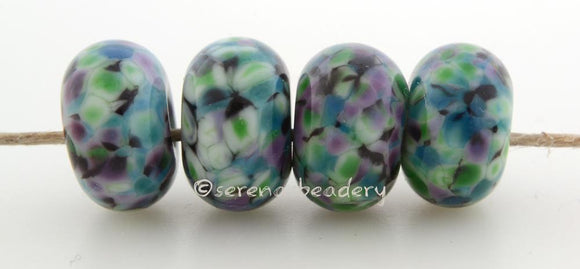Jitterbug Jitterbug frit beads in purple, blue, green and black.Bead Size: 6x11-12 or 7x13-14 mmHole Size: 2.5 mmprice is for one bead with a discount for 4 or more 11-12 mm,Glossy,13-14 mm,Glossy,11-12 mm,Matte,13-14 mm,Matte