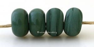 Juniper Color Notes: An opaque pine needle green. Available shapes and sizes:Round Bead Shapes: Available to order 8 to 15 mm with hole sizes ranging from 1.5 to 5 mm. See drop down menu for the exact options. Shown here in 8, 9 and 10 mm with both a 2.5 mm and 1.5 mm hole. 4 and 5 mm holes will fit European Charm style jewelry.Also available in a wavy disk or bead cap:. Pressed bead shapes:Lentil - 12x13 mm in size with a 1.5mm hole.: Pillow 13 mm square with a 1.5 mm hole.: Tab: Default Title