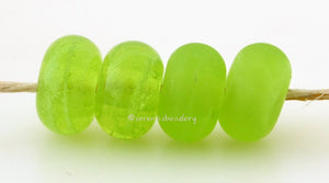 Jelly Bean Color Notes: An opaque pine needle green. Available shapes and sizes:Round Bead Shapes: Available to order 8 to 15 mm with hole sizes ranging from 1.5 to 5 mm. See drop down menu for the exact options. Shown here in 8, 9 and 10 mm with both a 2.5 mm and 1.5 mm hole. 4 and 5 mm holes will fit European Charm style jewelry.Also available in a wavy disk or bead cap:. Pressed bead shapes:Lentil - 12x13 mm in size with a 1.5mm hole.: Pillow 13 mm square with a 1.5 mm hole.: Tab: Default Title