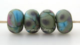 Icing on the Cake Olive green lampwork glass beads with turquoise pink and deep olive frit..Bead Size: 6x11-12 or 7x13-14 mmHole Size: 2.5 mmprice is for one bead with a discount for 4 or more 11-12 mm,Glossy,13-14 mm,Glossy,11-12 mm,Matte,13-14 mm,Matte