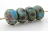 Icing on the Cake Olive green lampwork glass beads with turquoise pink and deep olive frit..Bead Size: 6x11-12 or 7x13-14 mmHole Size: 2.5 mmprice is for one bead with a discount for 4 or more 11-12 mm,Glossy,13-14 mm,Glossy,11-12 mm,Matte,13-14 mm,Matte