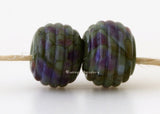 Woody Nightshade Ribbed Pair #2088 A pair of round ribbed lampwork glass bead in olive green with purple, brown, and cream.~~~~~~~~~~~~~~~~~~~~~~~~~~9x12 mm2 Beads2.5 mm hole These lampwork glass beads are ready to ship. Default Title