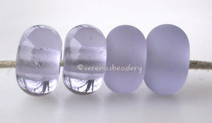 Raindrop Color Notes: A transparent bluish gray. Available shapes and sizes:Round Bead Shapes: Available to order 8 to 15 mm with hole sizes ranging from 1.5 to 5 mm. See drop down menu for the exact options. Shown here in 8, 9 and 10 mm with both a 2.5 mm and 1.5 mm hole. 4 and 5 mm holes will fit European Charm style jewelry.Also available in a wavy disk or bead cap:. Pressed bead shapes:Lentil - 12x13 mm in size with a 1.5mm hole.: Pillow 13 mm square with a 1.5 mm hole.: Tab: Default Title