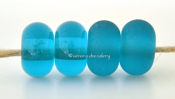 Aegean Color Notes: A transparent teal. Available shapes and sizes:Round Bead Shapes: Available to order 8 to 15 mm with hole sizes ranging from 1.5 to 5 mm. See drop down menu for the exact options. Shown here in 8, 9 and 10 mm with both a 2.5 mm and 1.5 mm hole. 4 and 5 mm holes will fit European Charm style jewelry.Also available in a wavy disk or bead cap:. Pressed bead shapes:Lentil - 12x13 mm in size with a 1.5mm hole.: Pillow 13 mm square with a 1.5 mm hole.: Tab: Default Title