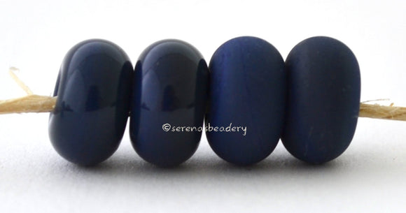 Prussian Color Notes: An deep opaque blue laden with silver. Available shapes and sizes:Round Bead Shapes: Available to order 8 to 15 mm with hole sizes ranging from 1.5 to 5 mm. See drop down menu for the exact options. Shown here in 8, 9 and 10 mm with both a 2.5 mm and 1.5 mm hole. 4 and 5 mm holes will fit European Charm style jewelry.Also available in a wavy disk or bead cap:. Pressed bead shapes:Lentil - 12x13 mm in size with a 1.5mm hole.: Pillow 13 mm square with a 1.5 mm hole.: Tab: Default Title