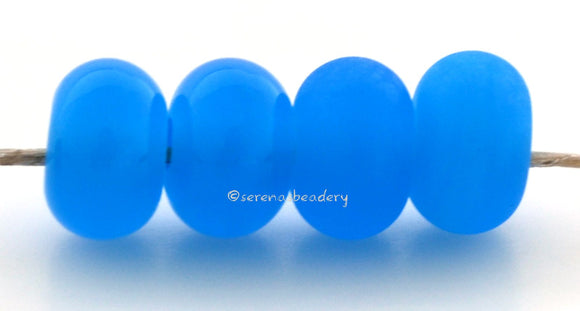 Merryweather Color Notes: An opal blue. Available shapes and sizes:Round Bead Shapes: Available to order 8 to 15 mm with hole sizes ranging from 1.5 to 5 mm. See drop down menu for the exact options. Shown here in 8, 9 and 10 mm with both a 2.5 mm and 1.5 mm hole. 4 and 5 mm holes will fit European Charm style jewelry.Also available in a wavy disk or bead cap:. Pressed bead shapes:Lentil - 12x13 mm in size with a 1.5mm hole.: Pillow 13 mm square with a 1.5 mm hole.: Tab: Default Title