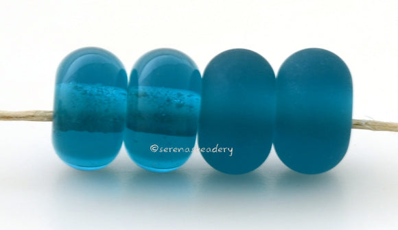 Serenity Color Notes: A transparent teal. Available shapes and sizes:Round Bead Shapes: Available to order 8 to 15 mm with hole sizes ranging from 1.5 to 5 mm. See drop down menu for the exact options. Shown here in 8, 9 and 10 mm with both a 2.5 mm and 1.5 mm hole. 4 and 5 mm holes will fit European Charm style jewelry.Also available in a wavy disk or bead cap:. Pressed bead shapes:Lentil - 12x13 mm in size with a 1.5mm hole.: Pillow 13 mm square with a 1.5 mm hole.: Tab: Default Title