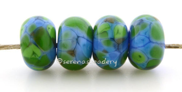 Leaping Water Blue and bright green and a bit of brown lampwork glass beads.Bead Size: 6x11-12 or 7x13-14 mmHole Size: 2.5 mmprice is for one bead with a discount for 4 or more 11-12 mm,Glossy,13-14 mm,Glossy,11-12 mm,Matte,13-14 mm,Matte