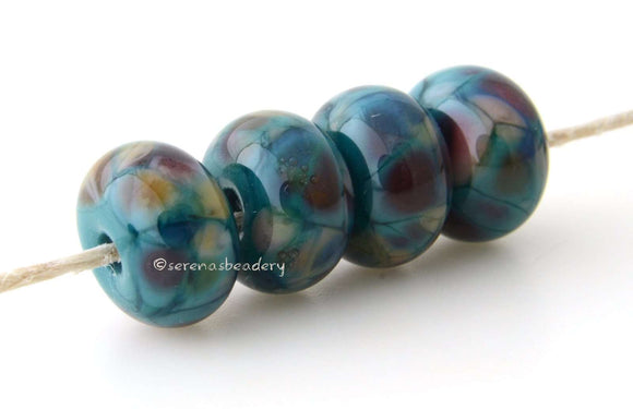 Exuberant Way Deep green lampwork glass beads with peach, cream, rose and purple.Bead Size: 6x11-12 or 7x13-14 mmHole Size: 2.5 mmprice is for one bead with a discount for 4 or more 11-12 mm,Glossy,13-14 mm,Glossy,11-12 mm,Matte,13-14 mm,Matte