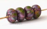 Twilight Blossom Deep purple lampwork glass beads with green, lilac, pink, plum, mauve and peach.Bead Size: 6x11-12 or 7x13-14 mmHole Size: 2.5 mmprice is for one bead with a discount for 4 or more 11-12 mm,Glossy,13-14 mm,Glossy,11-12 mm,Matte,13-14 mm,Matte