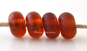 Indian Summer Color Notes: A transparent brown. Available shapes and sizes:Round Bead Shapes: Available to order 8 to 15 mm with hole sizes ranging from 1.5 to 5 mm. See drop down menu for the exact options. Shown here in 8, 9 and 10 mm with both a 2.5 mm and 1.5 mm hole. 4 and 5 mm holes will fit European Charm style jewelry.Also available in a wavy disk or bead cap:. Pressed bead shapes:Lentil - 12x13 mm in size with a 1.5mm hole.: Pillow 13 mm square with a 1.5 mm hole.: Tab: Default Title