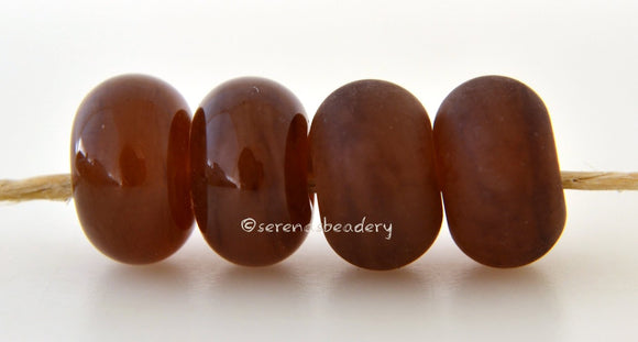 Allspice Color Notes: A fairly dark amber brown opalino. Available shapes and sizes:Round Bead Shapes: Available to order 8 to 15 mm with hole sizes ranging from 1.5 to 5 mm. See drop down menu for the exact options. Shown here in 8, 9 and 10 mm with both a 2.5 mm and 1.5 mm hole. 4 and 5 mm holes will fit European Charm style jewelry.Also available in a wavy disk or bead cap:. Pressed bead shapes:Lentil - 12x13 mm in size with a 1.5mm hole.: Pillow 13 mm square with a 1.5 mm hole.: Tab: Default Title
