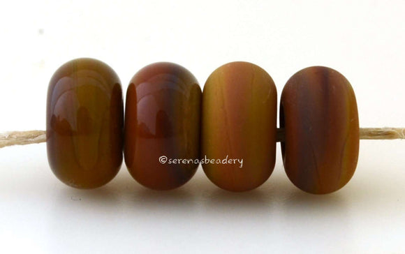 Canoe Color Notes: An opaque silver brown. Available shapes and sizes:Round Bead Shapes: Available to order 8 to 15 mm with hole sizes ranging from 1.5 to 5 mm. See drop down menu for the exact options. Shown here in 8, 9 and 10 mm with both a 2.5 mm and 1.5 mm hole. 4 and 5 mm holes will fit European Charm style jewelry.Also available in a wavy disk or bead cap:. Pressed bead shapes:Lentil - 12x13 mm in size with a 1.5mm hole.: Pillow 13 mm square with a 1.5 mm hole.: Tab: Default Title