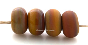 Serengeti Color Notes: An opaque earthy brown with red undertones. Available shapes and sizes:Round Bead Shapes: Available to order 8 to 15 mm with hole sizes ranging from 1.5 to 5 mm. See drop down menu for the exact options. Shown here in 8, 9 and 10 mm with both a 2.5 mm and 1.5 mm hole. 4 and 5 mm holes will fit European Charm style jewelry.Also available in a wavy disk or bead cap:. Pressed bead shapes:Lentil - 12x13 mm in size with a 1.5mm hole.: Pillow 13 mm square with a 1.5 mm hole.: Tab: Default T