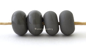 Koala Color Notes: An opaque neutral grey. Available shapes and sizes:Round Bead Shapes: Available to order 8 to 15 mm with hole sizes ranging from 1.5 to 5 mm. See drop down menu for the exact options. Shown here in 8, 9 and 10 mm with both a 2.5 mm and 1.5 mm hole. 4 and 5 mm holes will fit European Charm style jewelry.Also available in a wavy disk or bead cap:. Pressed bead shapes:Lentil - 12x13 mm in size with a 1.5mm hole.: Pillow 13 mm square with a 1.5 mm hole.: Tab: Default Title
