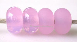 Rose Quartz Color Notes: A soft opal pink. Available shapes and sizes:Round Bead Shapes: Available to order 8 to 15 mm with hole sizes ranging from 1.5 to 5 mm. See drop down menu for the exact options. Shown here in 8, 9 and 10 mm with both a 2.5 mm and 1.5 mm hole. 4 and 5 mm holes will fit European Charm style jewelry.Also available in a wavy disk or bead cap:. Pressed bead shapes:Lentil - 12x13 mm in size with a 1.5mm hole.: Pillow 13 mm square with a 1.5 mm hole.: Tab: Default Title