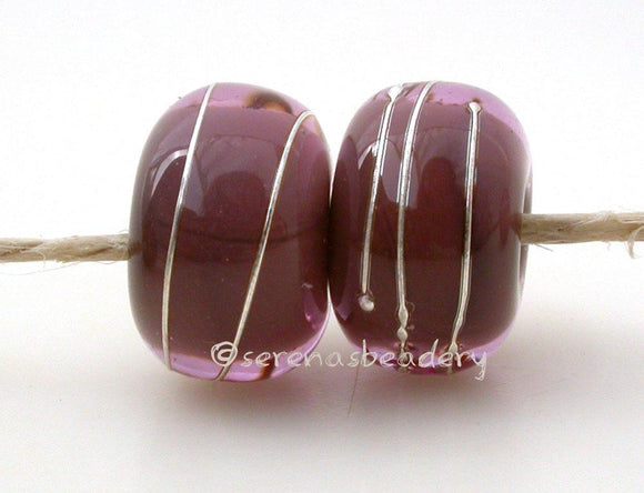 Pink Dark Brown Age Old A layer of pink over dark brown with a silver wrap.   6x12 mm with a 2.5 mm hole. Price is per bead. Glossy,Matte