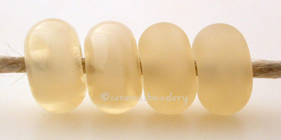 Pearl Beige Color Notes: Mystic colors have a wonderful almost vintage givre look to them. There is a streak of opaque color within the transparent color. 5x10 mm Available shapes and sizes:Round Bead Shapes: Available to order 8 to 15 mm with hole sizes ranging from 1.5 to 5 mm. See drop down menu for the exact options. Shown here in 8, 9 and 10 mm with both a 2.5 mm and 1.5 mm hole. 4 and 5 mm holes will fit European Charm style jewelry.Also available in a wavy disk or bead cap:. Pressed bead shapes:Lenti