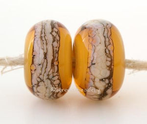 Amber Granite White Heart An amber white heart bead with a stripe of silvered ivory granite6x12 mmprice is per bead Glossy,Matte