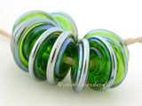 Iris Green Luster Wavy Disks 3x13-1410 BeadsHole Size: 2.5 mm~ A light green with a silver luster finish. Skinny little wavy disks. ~   Default Title