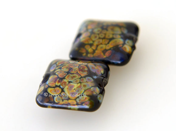 Black Raku Pair a pair of black pillows covered in raku frit Shown above in 13 mm. Available in 15mm and 18mm. Price is per pair Glossy,13 mm,Glossy,15 mm,Glossy,18 mm,Matte,13 mm,Matte,15 mm,Matte,18 mm