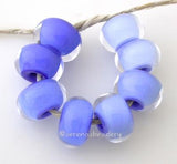 Blue Ombre one pair each of periwinkle, dark periwinkle, french blue, and light cobalt cased in clearAvailable in a matte finish too6x12 mmprice is per set of 8 beads Glossy,Matte