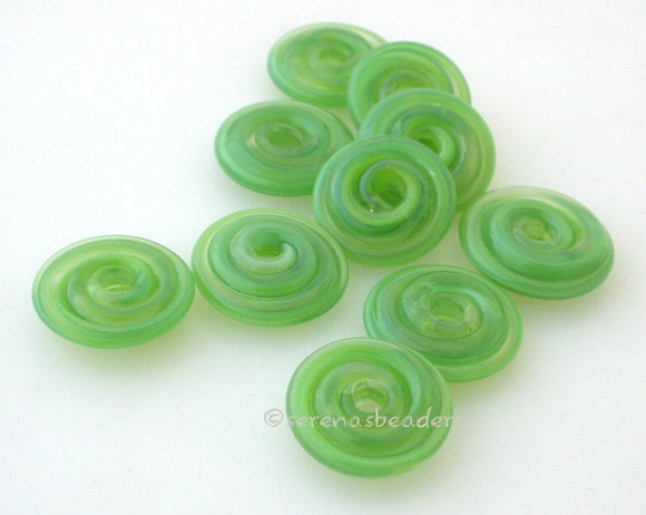 Lemon Lime Wavy Disk Spacer wavy disks in lemon lime2 sizes available: 11-12 mm with 1.5 mm hole or 13-14 mm with 2.5 mm holeprice is per 1 disk 11-12 mm 1.5 mm hole,12-13 mm 2.5 mm hole