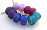 Bohemian Rainbow Bohemian Rainbow in rich festive colors. Mixing and layering colors in glass can be lots of fun. This set is a result of layering different colors over pink. Mutated lavender, berry, teal, blue and purple. You can order each color separately or the set of 10 beads as shown.Bead Size:7x12 mmAmount:10 BeadsHole Size:2.5 mm Glossy,Lavender,Glossy,Berry,Glossy,Teal Blue,Glossy,Purple,Glossy,Full Set of 10 Pairs,Matte,Lavender,Matte,Berry,Matte,Teal Blue,Matte,Purple,Matte,Full Set of 10 Pairs
