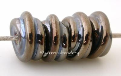 Bronze Beauty Raised Spiral bronze luster beads with a raised spiral6x12 mmprice is per bead Default Title