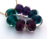 Clearly Color Cleary Color pairs - bold intense shades of purple, steel blue, berry and teal. Each has a bold colored heart or center and is cased in clear. You can order each color separately or the set of 8 beads as shown and in glossy or matte.Bead Size:7x12 mmAmount:1 BeadHole Size:2.5 mm Glossy,Steel Blue,Glossy,Berry Teal,Glossy,Purple,Glossy,Full Set of 4 Pairs,Matte,Steel Blue,Matte,Berry Teal,Matte,Purple,Matte,Full Set of 4 Pairs