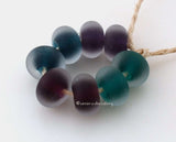 Clearly Color Cleary Color pairs - bold intense shades of purple, steel blue, berry and teal. Each has a bold colored heart or center and is cased in clear. You can order each color separately or the set of 8 beads as shown and in glossy or matte.Bead Size:7x12 mmAmount:1 BeadHole Size:2.5 mm Glossy,Steel Blue,Glossy,Berry Teal,Glossy,Purple,Glossy,Full Set of 4 Pairs,Matte,Steel Blue,Matte,Berry Teal,Matte,Purple,Matte,Full Set of 4 Pairs