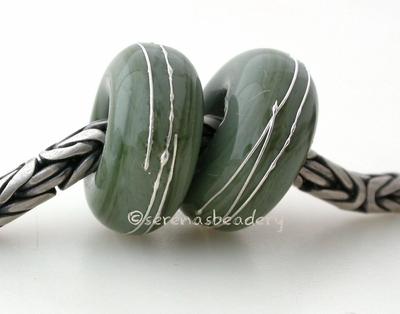 Commando Green Fine Silver Wrap European Charm Bead one commando green handmade lampwork glass European charm spacer bead with a fine silver wrap6x14 mm with a 5mm holeprice is per bead Glossy,Matte
