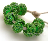 Emerald Sugar Emerald green beads covered in bright green sugar frit   Bead Size: 6x12 mm Hole Size: 2.5 mm price is for one bead with a discount for 4 or mores Glossy,Matte