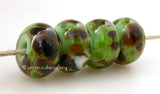 Grass Savannah Mint grass green lampwork glass beads with savannah frit.Bead Size: 6x11-12 or 7x13-14 mmHole Size: 2.5 mmprice is for one bead with a discount for 4 or more 11-12 mm,Glossy,13-14 mm,Glossy,11-12 mm,Matte,13-14 mm,Matte