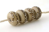4 Sage brown Fine Silver Dots Khaki brown with fine silver droplets.~~~~~~~~~~~~~~~~~~~~~~~~~~6x11, 12 or 7x13 mm4 Beads2.5 mm hole Glossy,11 mm,Glossy,12 mm,Glossy,13 mm,Matte,11 mm,Matte,12 mm,Matte,13 mm