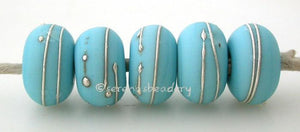 TURQUOISE BLUE with fine SILVER Wraps light turquoise blue lampwork glass beads wrapped with fine silver wire~~~~~~~~~~~~~~~~~~~~~~~~~~6x11, 12 or 7x13 mm5 Beads2.5 mm hole Glossy,11 mm,Matte,11 mm,Glossy,12 mm,Matte,12 mm,Glossy,13 mm,Matte,13 mm