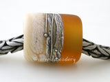 Light Amber Beach European Charm One european charm style bracelet bead with ivory, silvered ivory, fine silver and light amber.Bead Size:13x11 mmAmount:1 BeadHole Size:5 mm Glossy,Matte