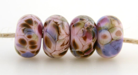 Jungle Blooms Pink lampwork glass beads with dark green purple and pink frit.Bead Size: 6x11-12 or 7x13-14 mmHole Size: 2.5 mmprice is for one bead with a discount for 4 or more 11-12 mm,Glossy,13-14 mm,Glossy,11-12 mm,Matte,13-14 mm,Matte