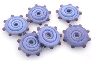 Lavender Blue with Purple Dots Lavender blue disks with dark purple dots.3x17-18 mm price is per 6 disks 11-12 mm 1.5 mm hole,12-13 mm 2.5 mm hole