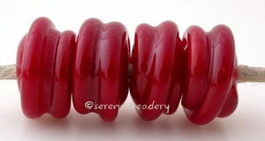 Light Red Raised Spirals light red beads with a raised spiral6x12 mmprice is per bead Glossy,Matte