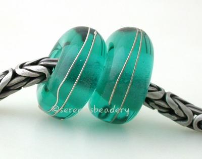Light Teal Fine Silver Wrap European Charm Bead one light teal handmade lampwork glass european charm spacer bead with a fine silver wrap5x13mm with a 5mm holeprice is per bead Glossy,Matte