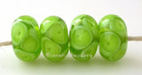 Lime Green Bubbles bright lime green bubbles 7x12 mm 2.5mm hole price is per bead All of my lampwork glass beads are individually handmade using Effetre, Vetrofond, or Lauscha, Reichenbach, Double Helix, and Bullseye glass rods. They are annealed in a digitally controlled kiln for everlasting strength and durability. Default Title